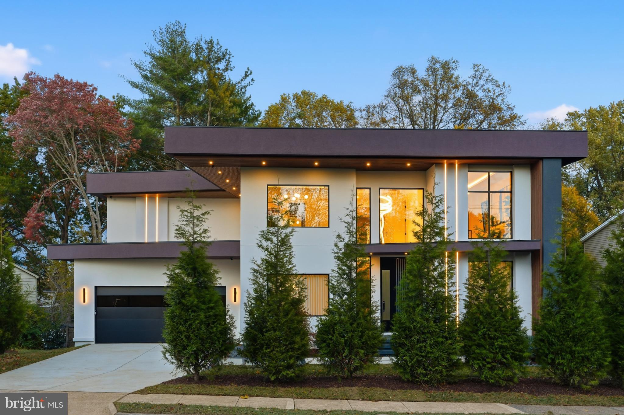 9408 Old Courthouse Road Vienna, VA 22182 - Photo 2 of 92 Sleek modern home with vibrant landscaping.
