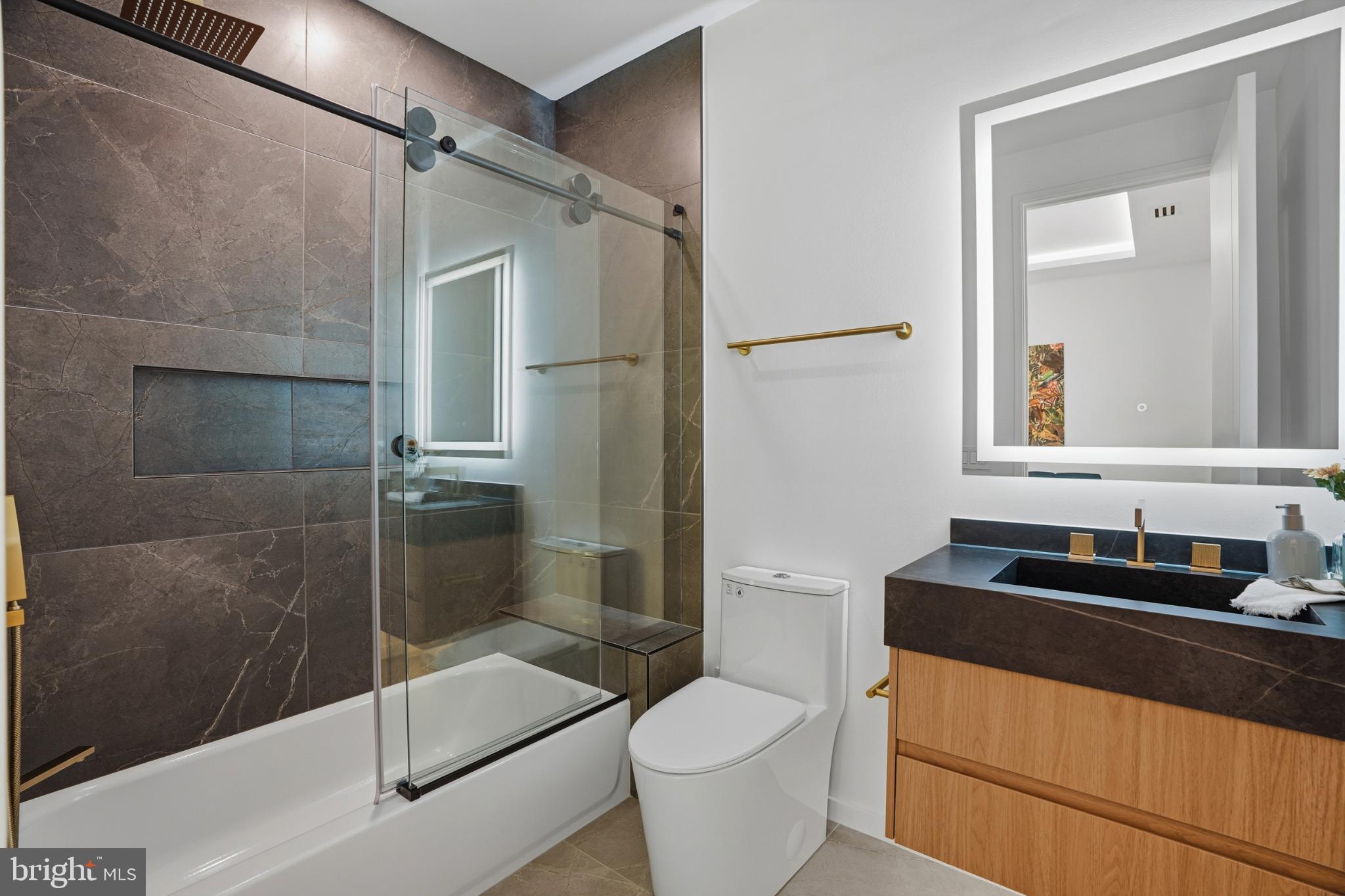 9408 Old Courthouse Road Vienna, VA 22182 - Photo 61 of 92 Sleek modern bathroom with elegant finishes.