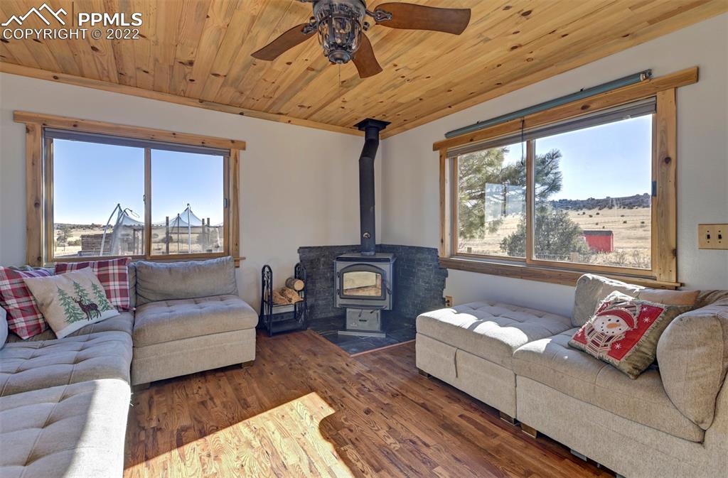 8225 3 R Road Beulah, CO 81023 - Photo 11 of 41 a living room with furniture and a large window