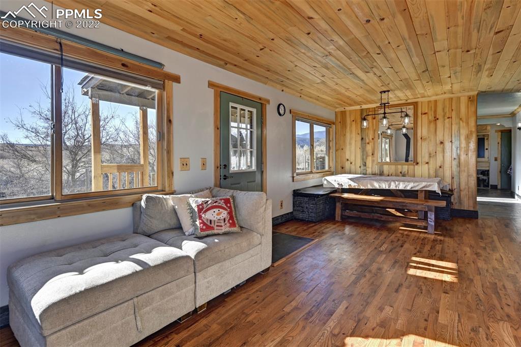 8225 3 R Road Beulah, CO 81023 - Photo 13 of 41 a living room with furniture and a large window