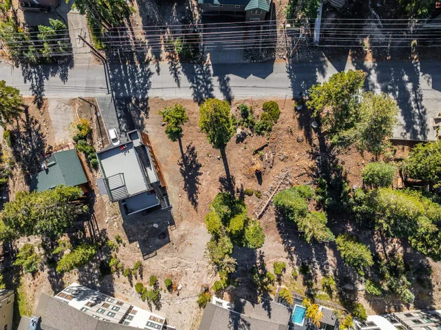 a view of a swimming pool with sitting area