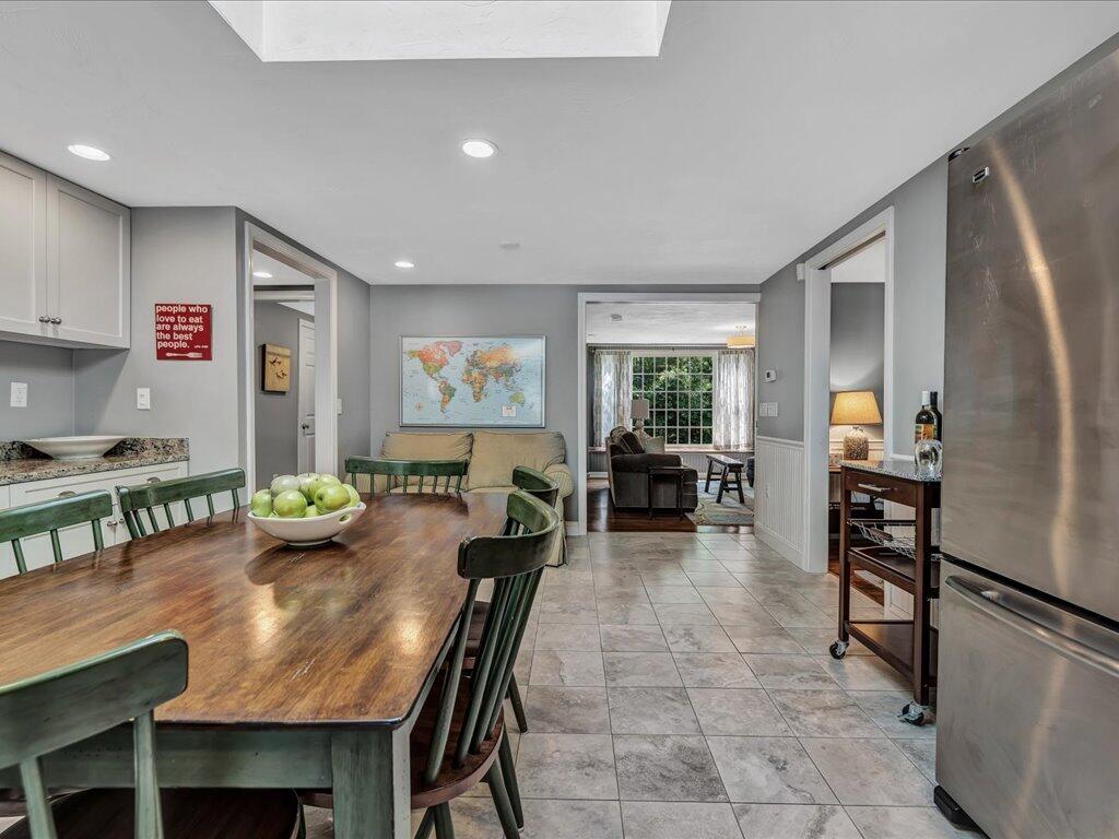 1309 Shootflying Hill Road Centerville, MA 02632 - Photo 15 of 52 a view of a dining room with furniture