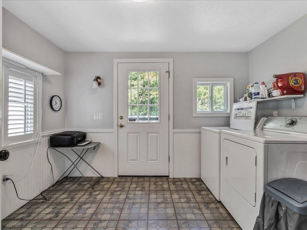 1309 Shootflying Hill Road Centerville, MA 02632 - Photo 20 of 52 a view of a storage & utility room with a window