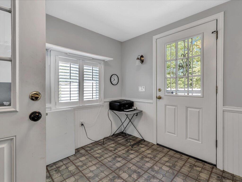 1309 Shootflying Hill Road Centerville, MA 02632 - Photo 21 of 52 a view of empty room with windows