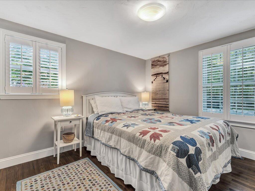 1309 Shootflying Hill Road Centerville, MA 02632 - Photo 26 of 52 a bedroom with a bed and a window