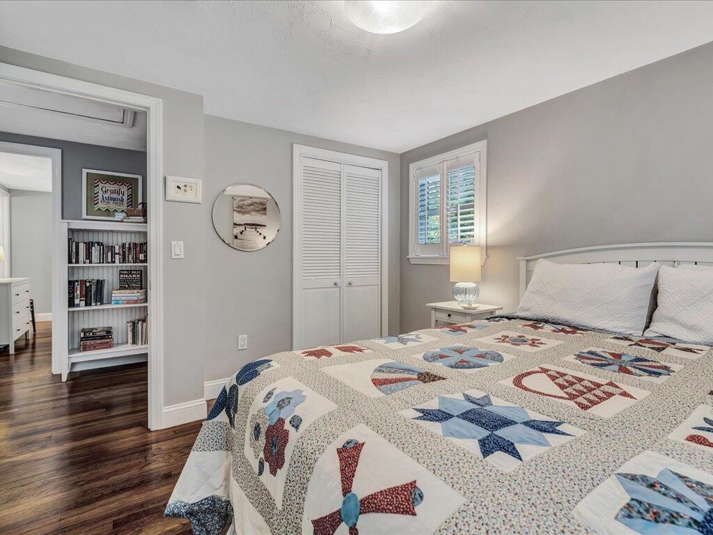 1309 Shootflying Hill Road Centerville, MA 02632 - Photo 28 of 52 a bedroom with a bed and a window