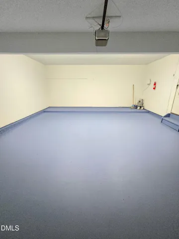 a bathroom with a bathtub sink and mirror