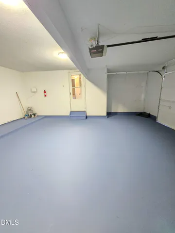 a spacious bathroom with a bathtub and a shower