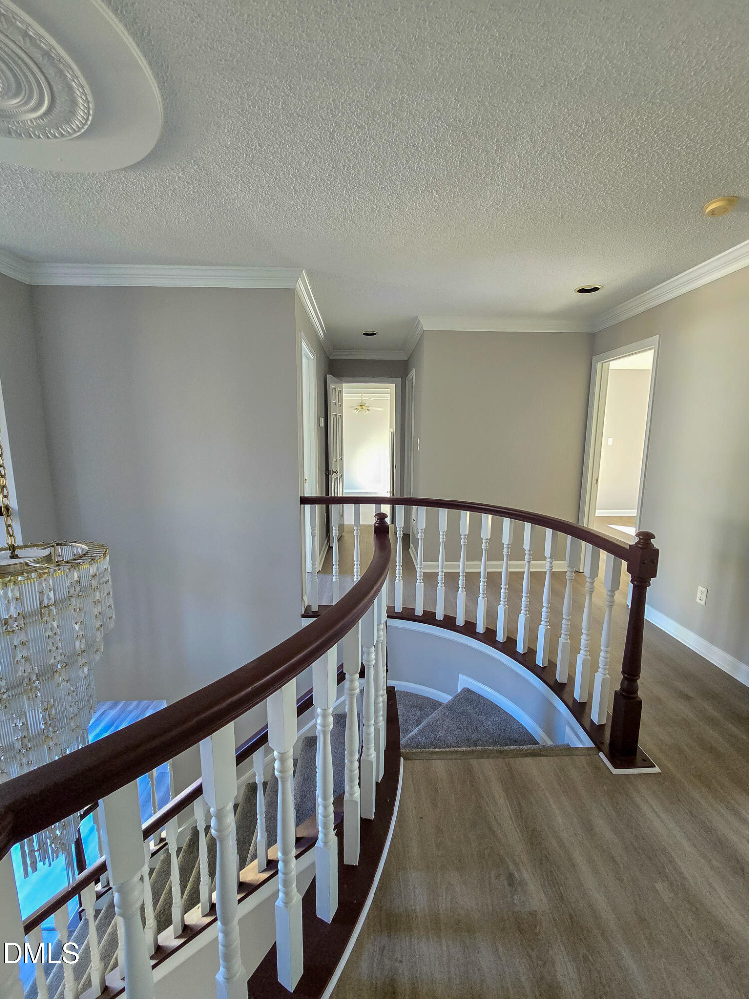 2205 Dungiven Court Garner, NC 27529 - Photo 28 of 66 a view of staircase with railing and white walls