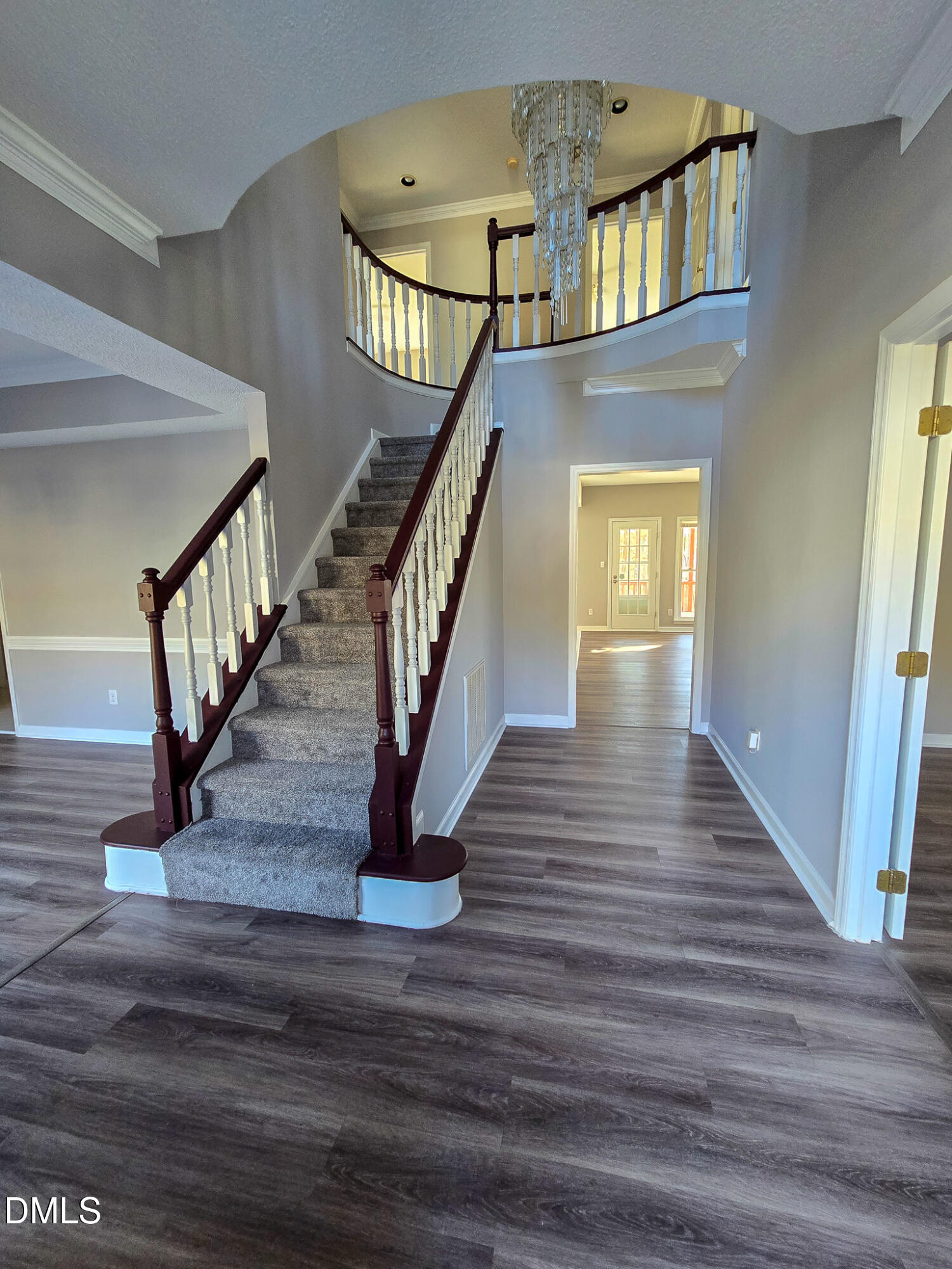 2205 Dungiven Court Garner, NC 27529 - Photo 3 of 66 a view of entryway and hall with wooden floor