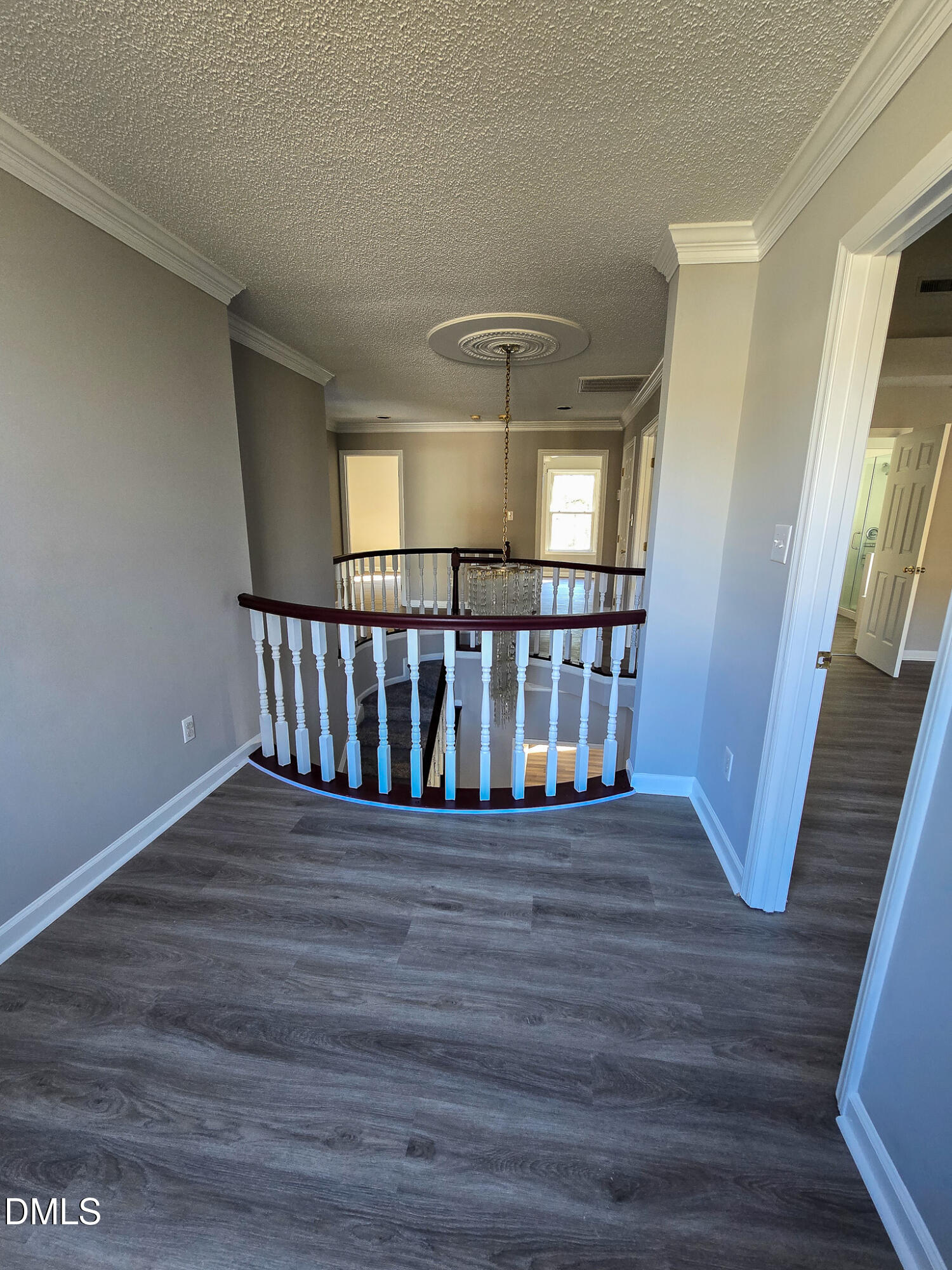 2205 Dungiven Court Garner, NC 27529 - Photo 41 of 66 a view of entryway with wooden floor