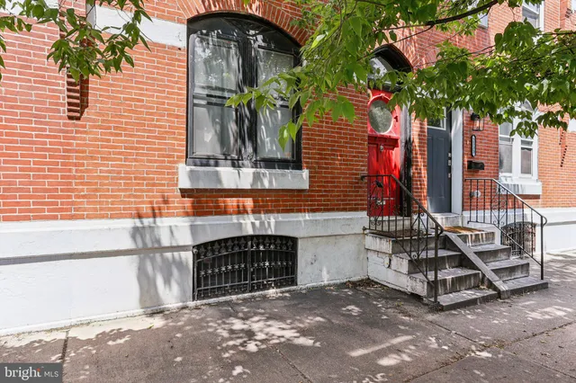 a front view of a house with a garage