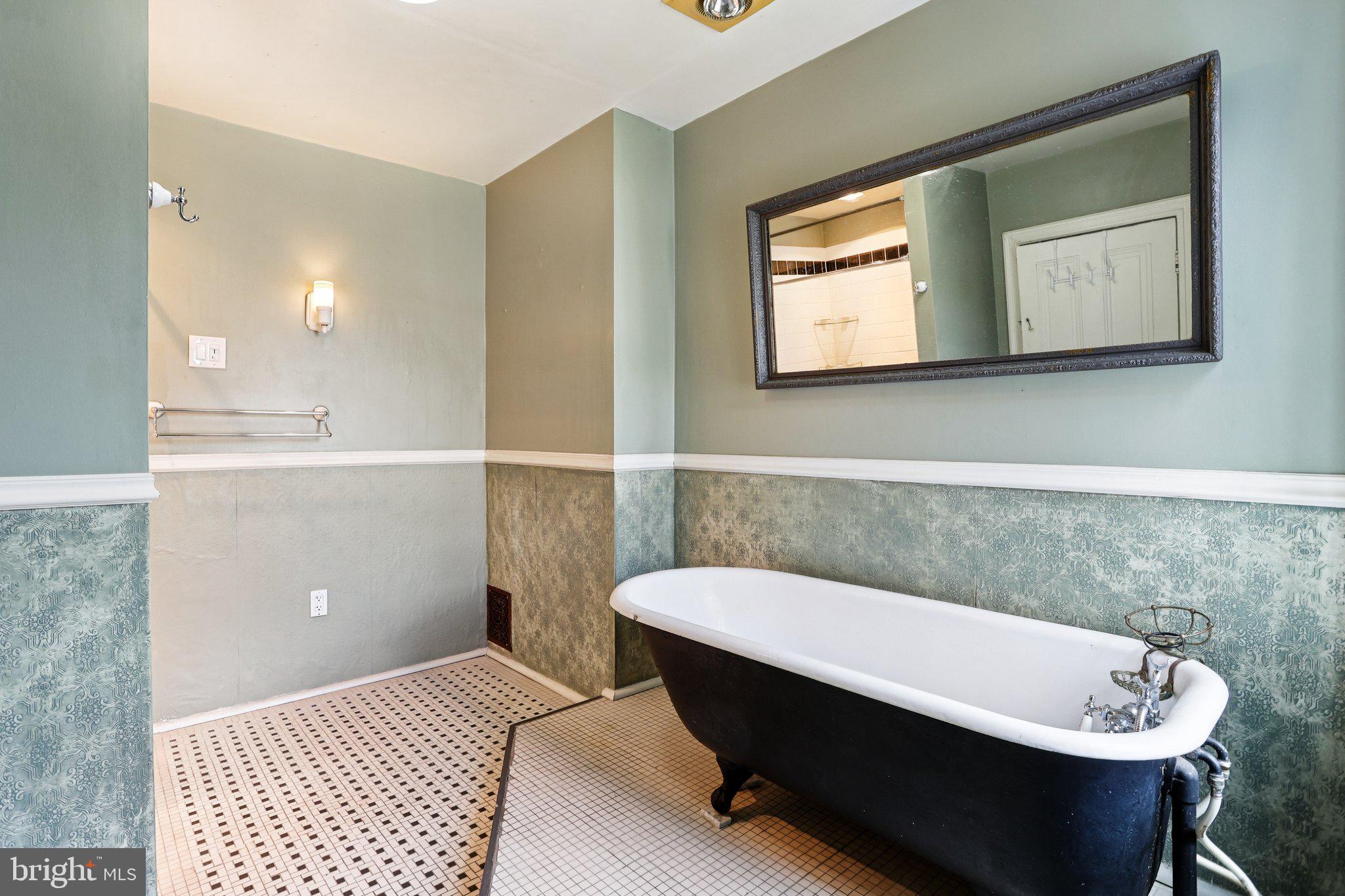 2335 Christian Street Philadelphia, PA 19146 - Photo 15 of 33 a bathroom with a sink and a bathtub