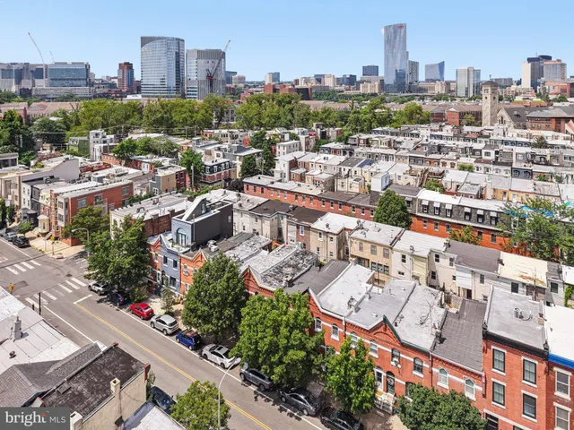 a view of a city with tall buildings