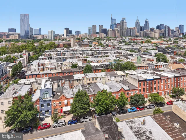 a view of a city with tall buildings