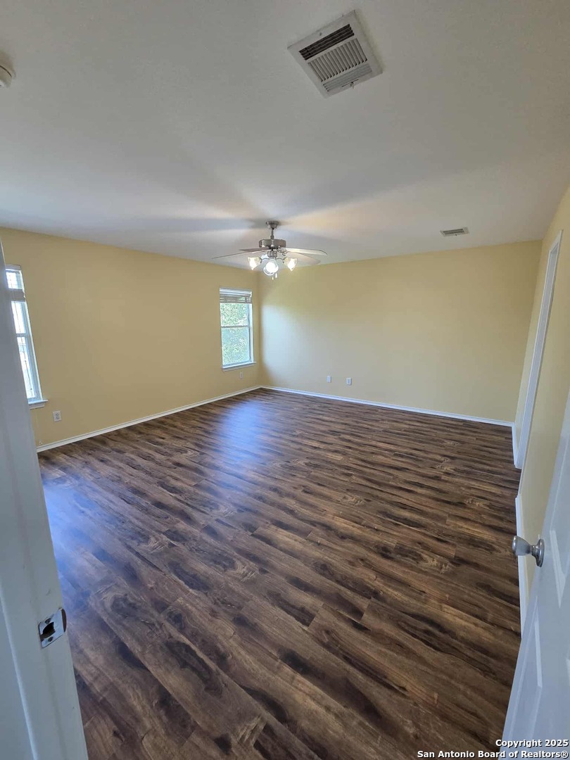 228 Anvil Place Cibolo, TX 78108 - Photo 17 of 21 wooden floor in an empty room