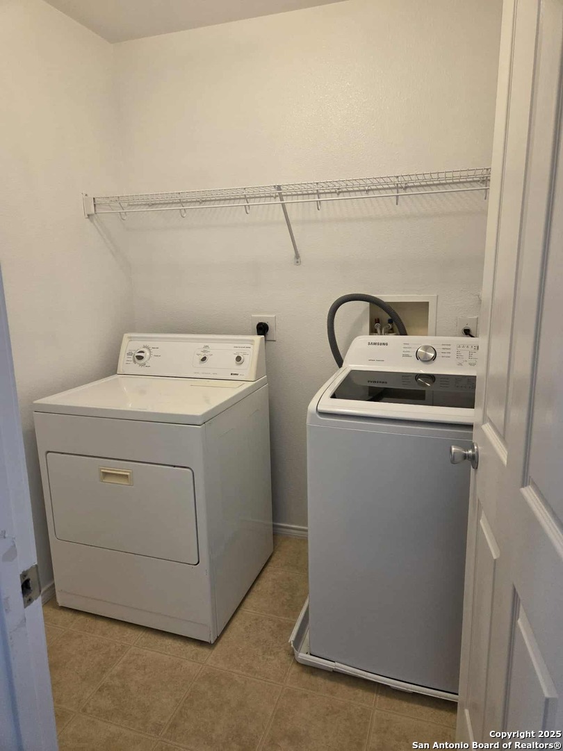 228 Anvil Place Cibolo, TX 78108 - Photo 20 of 21 a utility room with dryer and washer