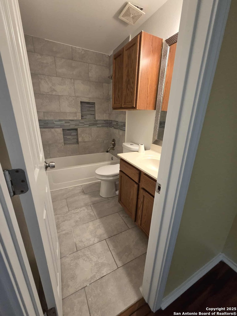 228 Anvil Place Cibolo, TX 78108 - Photo 10 of 21 a bathroom with a sink a toilet and shower