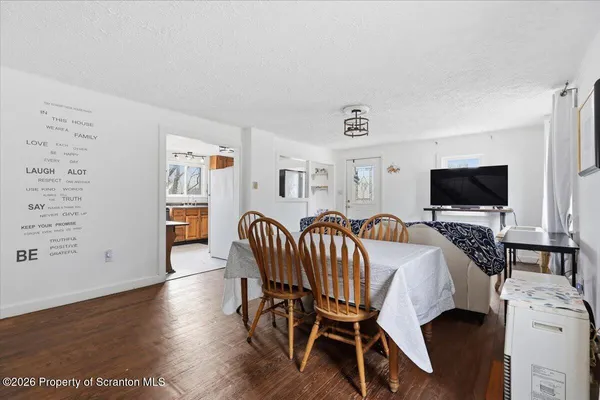 a view of a dining room with furniture