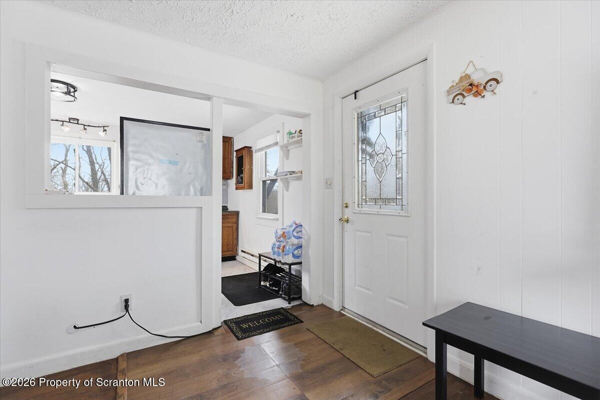 22 Quay Avenue Mount Pocono, PA 18344 - Photo 17 of 62 a room with gym equipment and a view of living room
