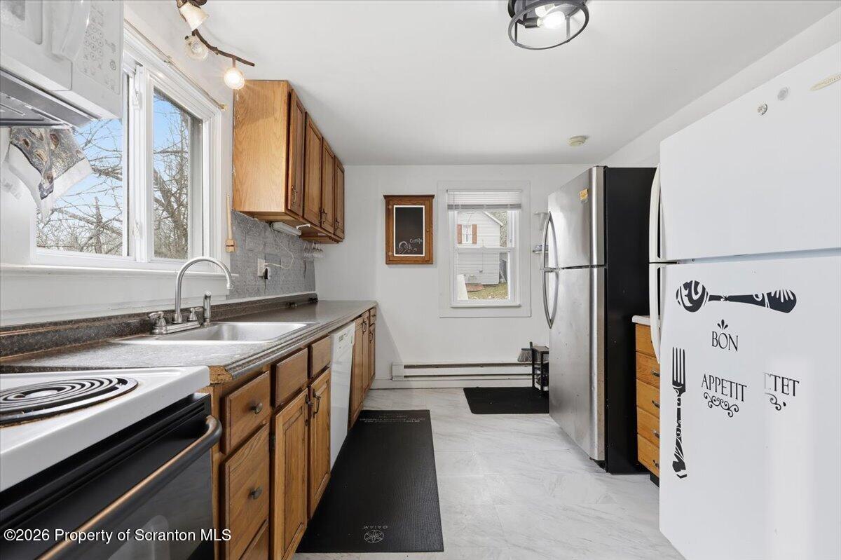 22 Quay Avenue Mount Pocono, PA 18344 - Photo 19 of 62 a kitchen with stainless steel appliances granite countertop a sink stove and refrigerator