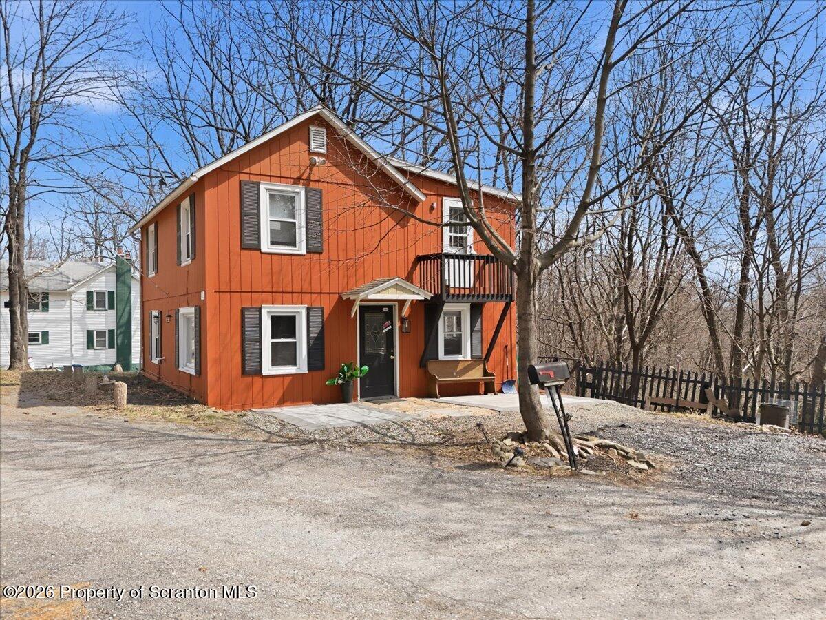 22 Quay Avenue Mount Pocono, PA 18344 - Photo 2 of 62 a front view of a house with a yard