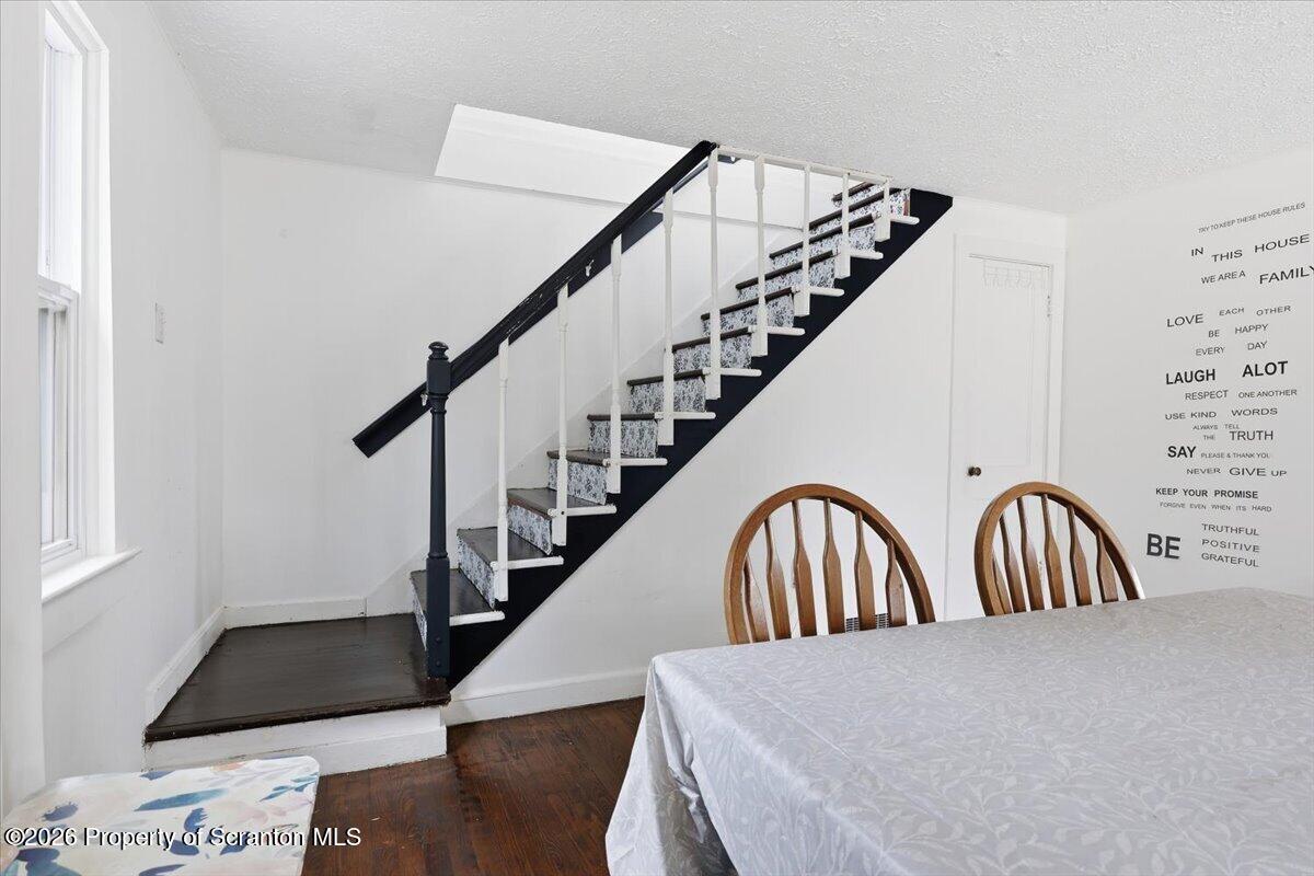 22 Quay Avenue Mount Pocono, PA 18344 - Photo 26 of 62 a view of staircase with wooden floor and a potted plant