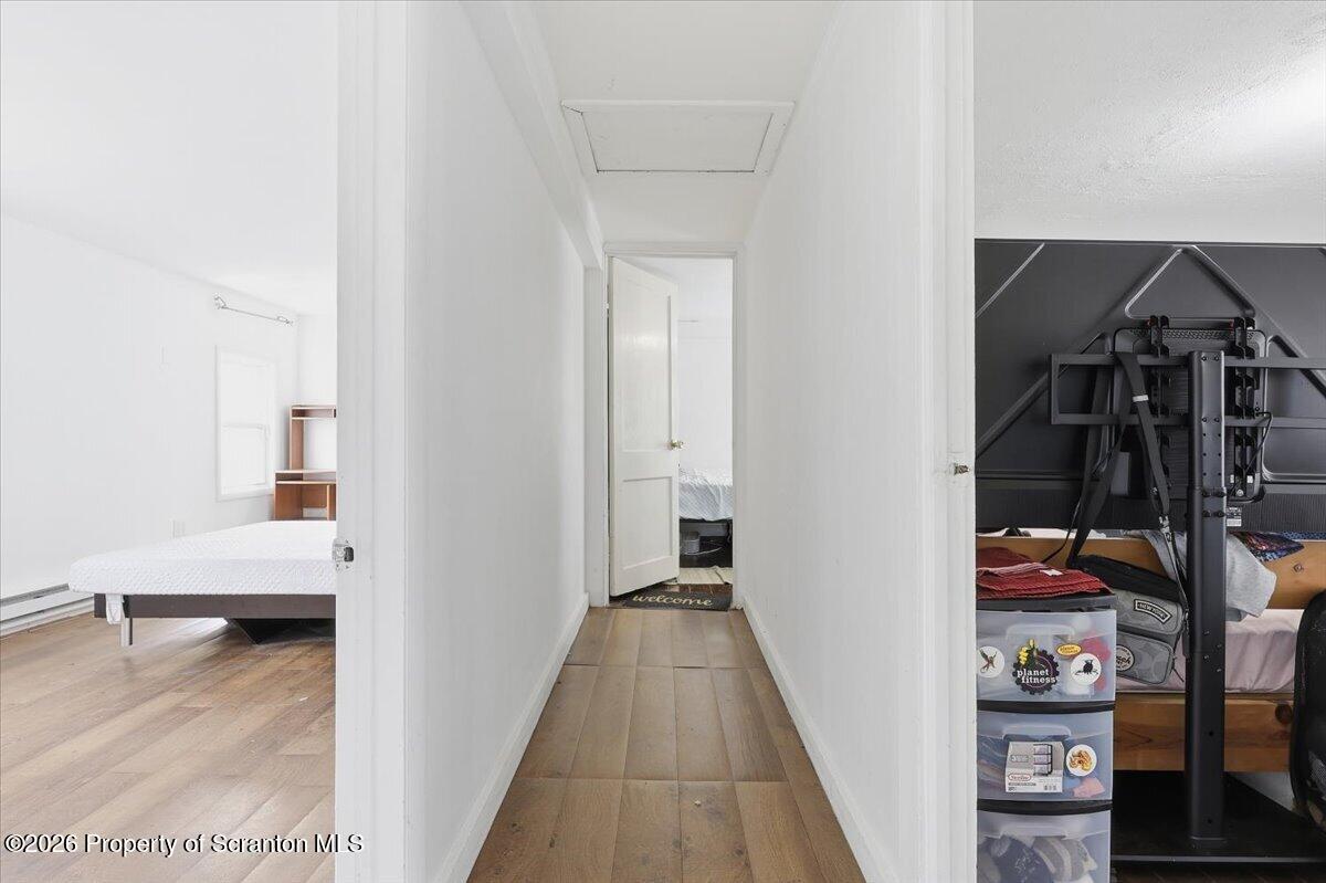 22 Quay Avenue Mount Pocono, PA 18344 - Photo 28 of 62 a view of a hallway with wooden floor and entryway