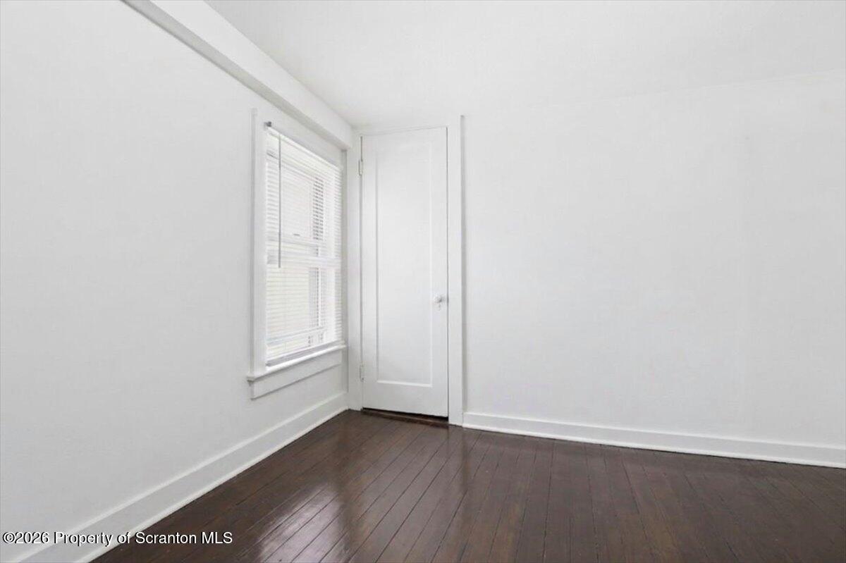 22 Quay Avenue Mount Pocono, PA 18344 - Photo 29 of 62 an empty room with wooden floor and window