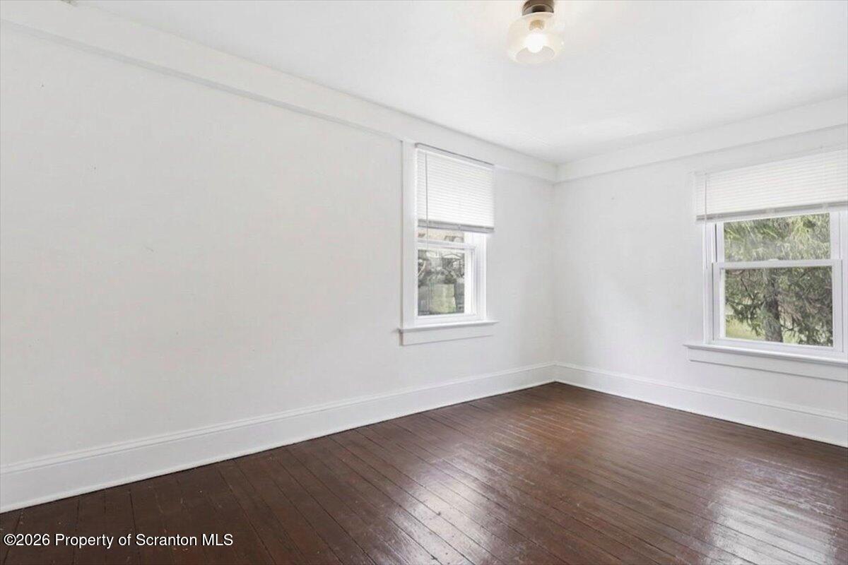 22 Quay Avenue Mount Pocono, PA 18344 - Photo 30 of 62 an empty room with wooden floor and windows