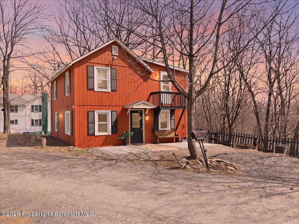 22 Quay Avenue Mount Pocono, PA 18344 - Photo 3 of 62 a front view of a house with a yard
