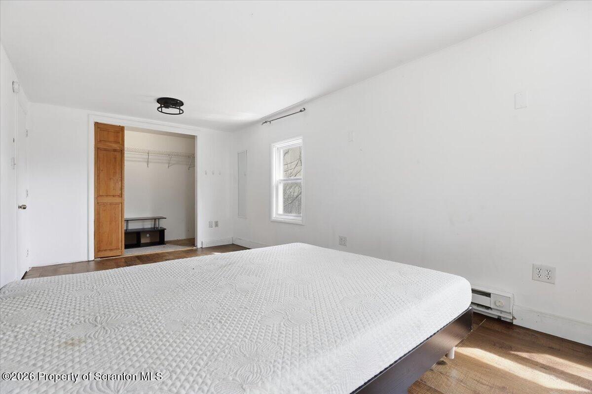 22 Quay Avenue Mount Pocono, PA 18344 - Photo 36 of 62 a bedroom with a bed and a window