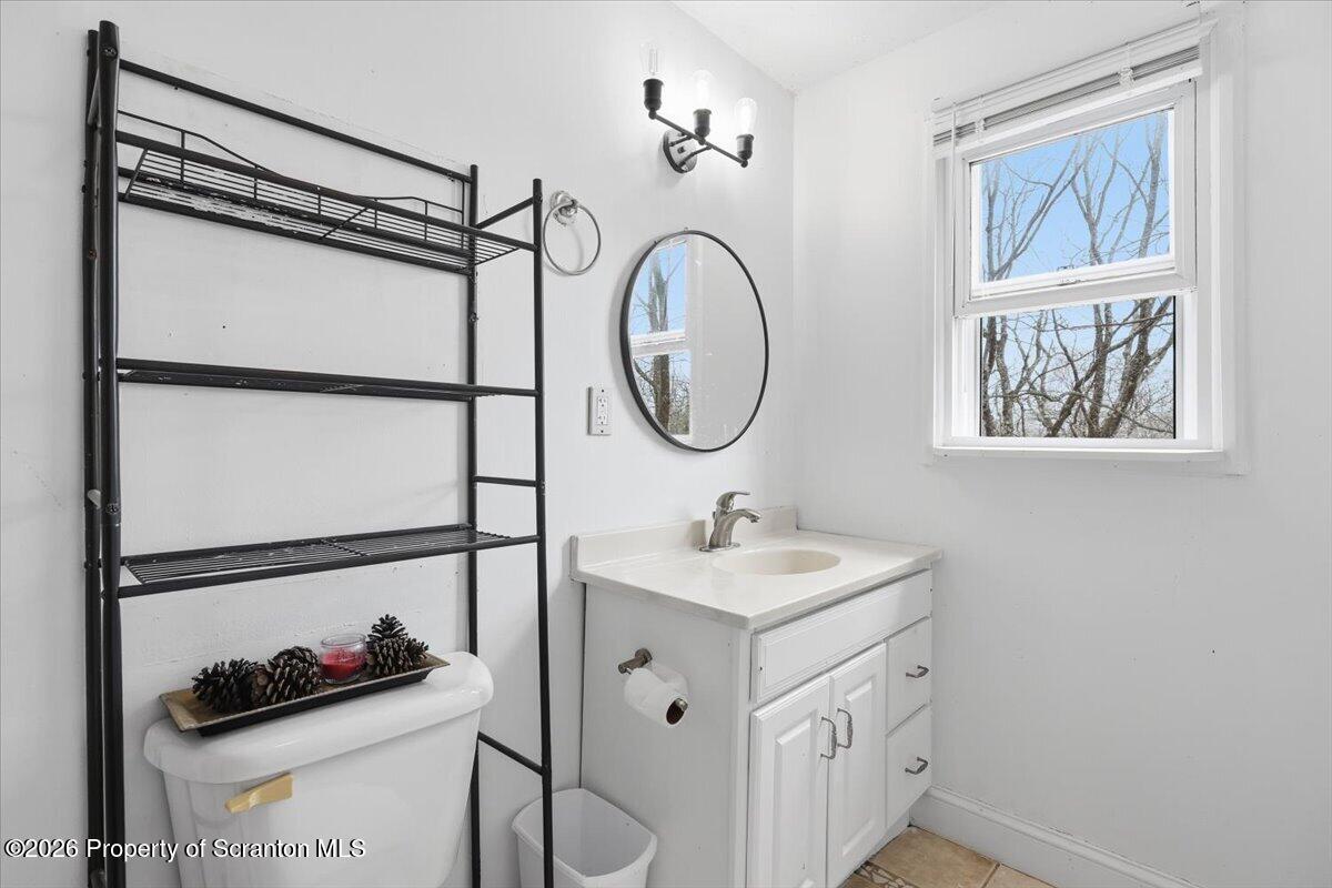 22 Quay Avenue Mount Pocono, PA 18344 - Photo 38 of 62 a bathroom with a double vanity sink and a mirror