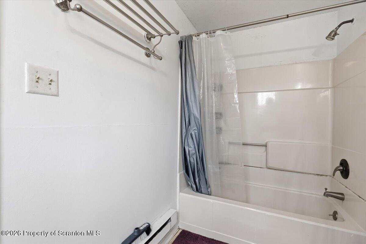 22 Quay Avenue Mount Pocono, PA 18344 - Photo 39 of 62 a bathroom with a bathtub and a shower