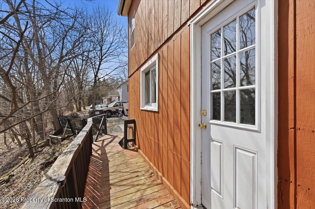 22 Quay Avenue Mount Pocono, PA 18344 - Photo 47 of 62 a view of a balcony with wooden floor and stairs