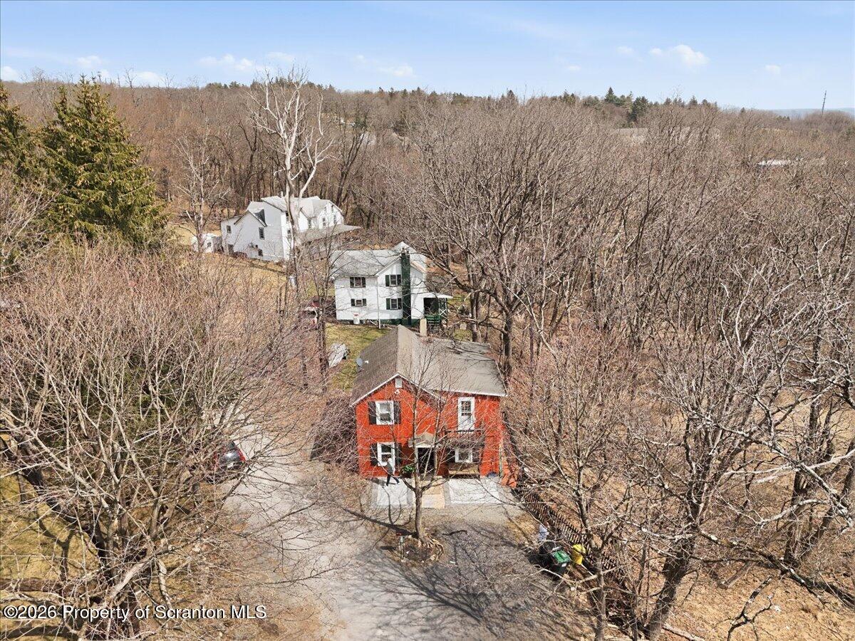 22 Quay Avenue Mount Pocono, PA 18344 - Photo 54 of 62 an aerial view of a house with a yard and mountain view