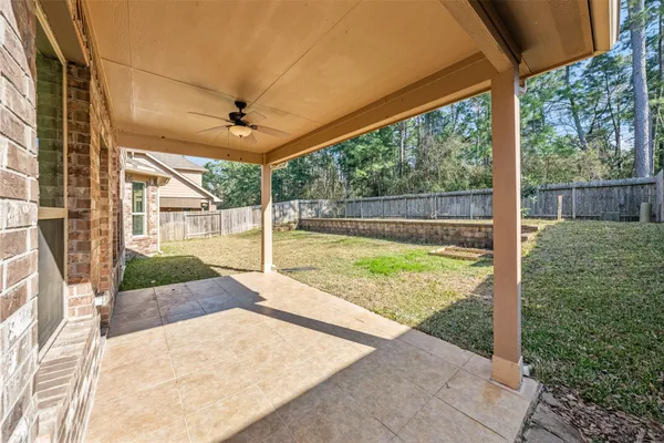 a view of a porch with a garden