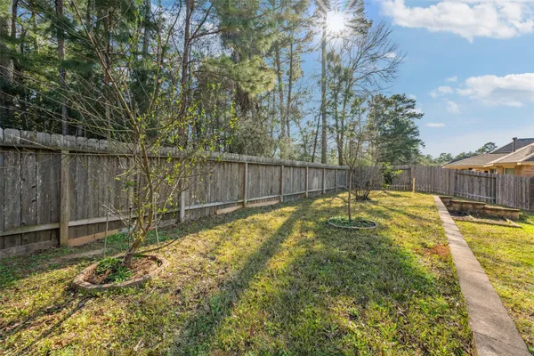 a swimming pool with wooden fence