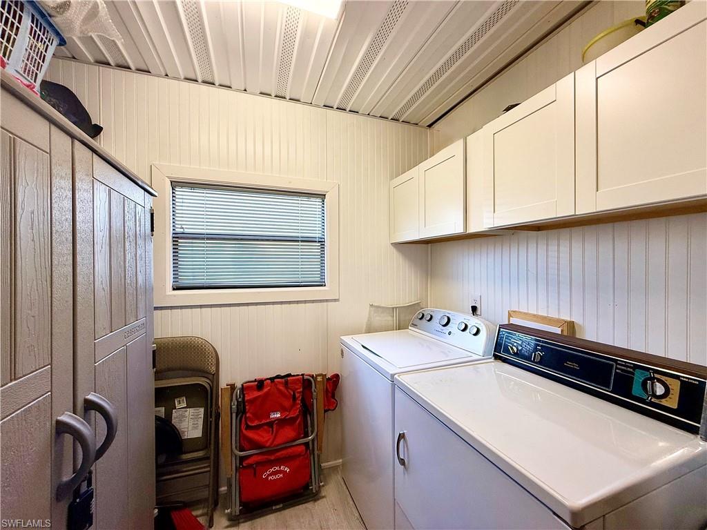 16 Bass Lane, Unit 16 Naples, FL 34114 - Photo 14 of 45 a utility room with dryer and washer