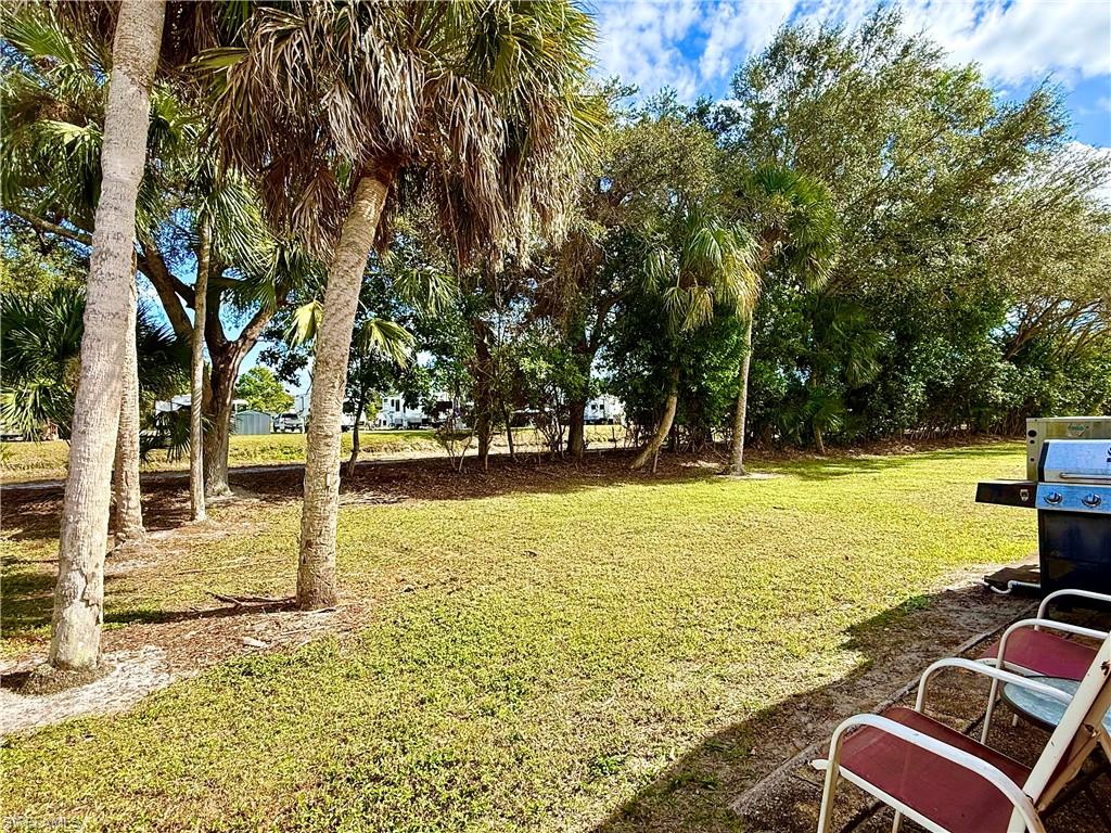 16 Bass Lane, Unit 16 Naples, FL 34114 - Photo 5 of 45 a view of an ocean with trees