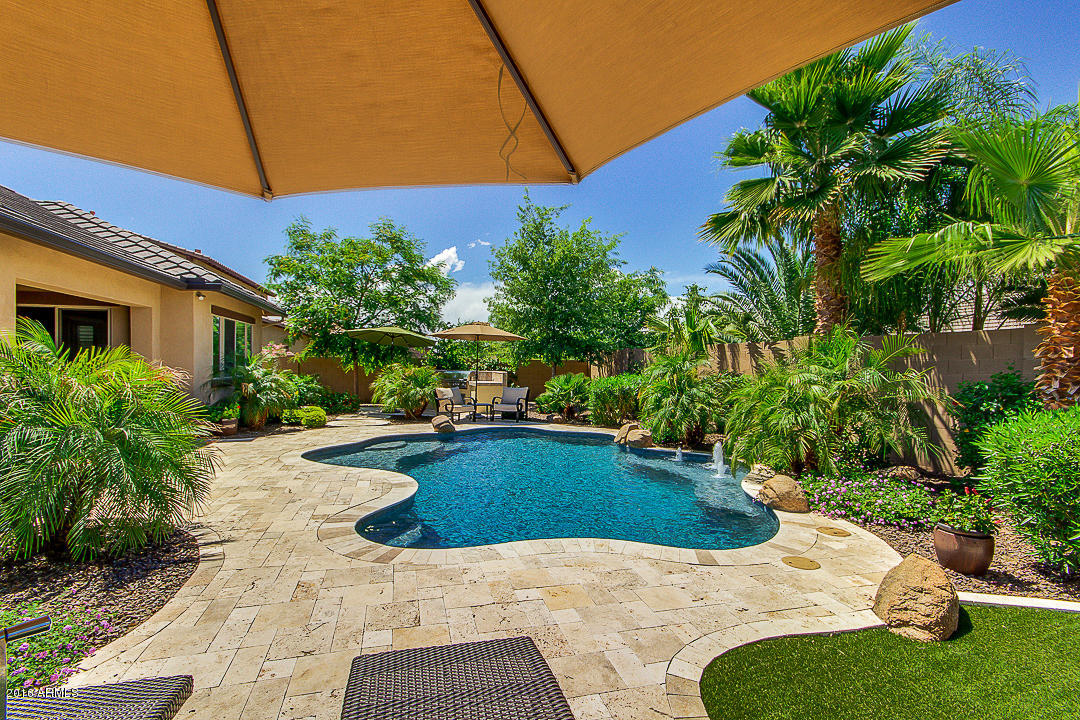 2834 East Warbler Road Gilbert, AZ 85297 - Photo 56 of 63 Travertine pool decking