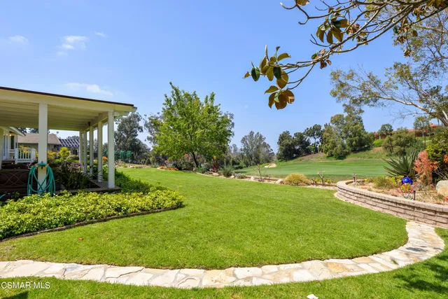 a view of a golf course with a garden