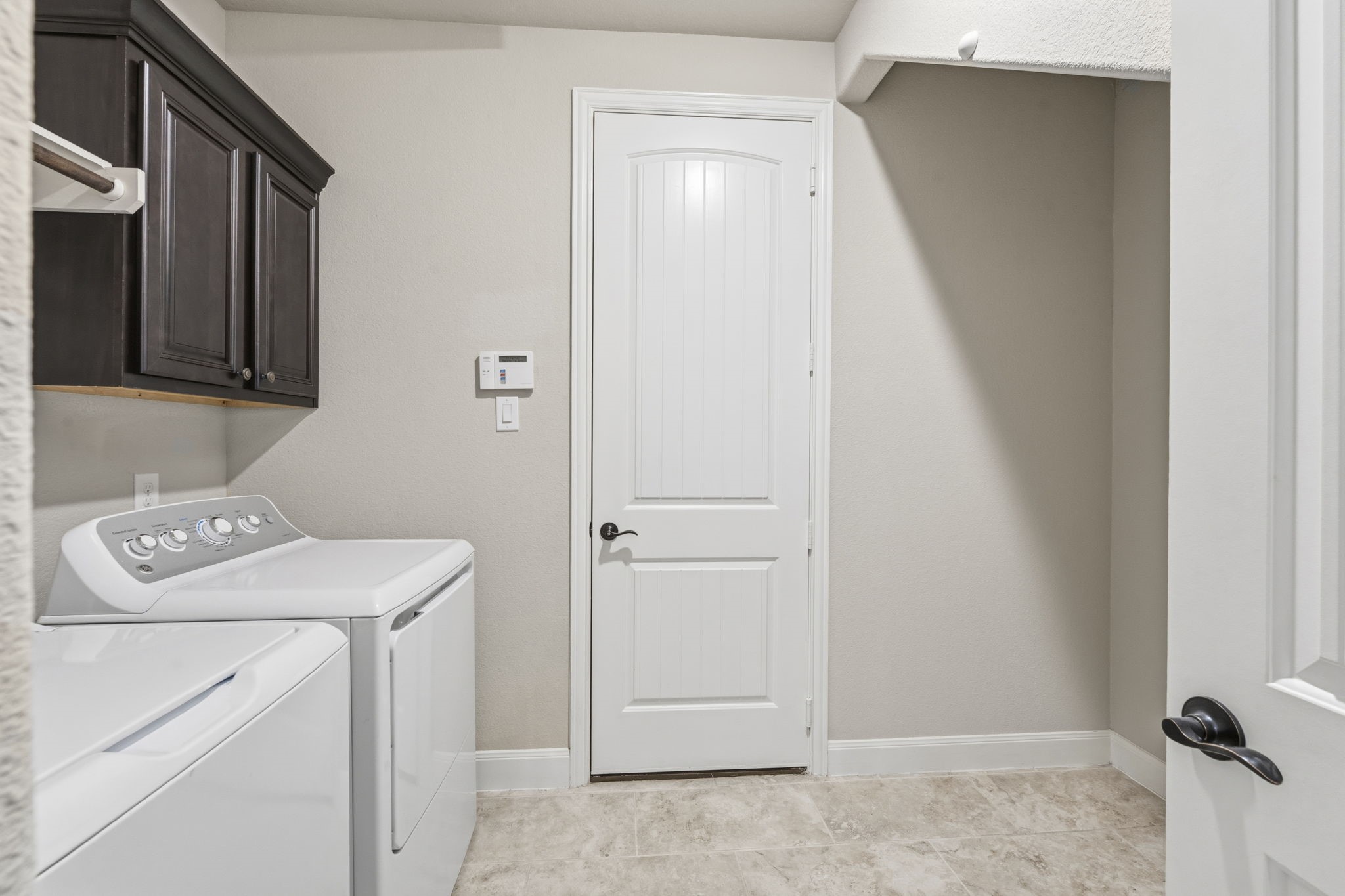 25210 Gaddis Oaks Drive Spring, TX 77389 - Photo 23 of 50 a utility room with dryer and washer