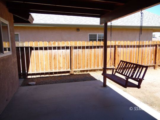 208 South Greenlawn Street Ridgecrest, CA 93555 - Photo 27 of 29 a view of an empty room with a window