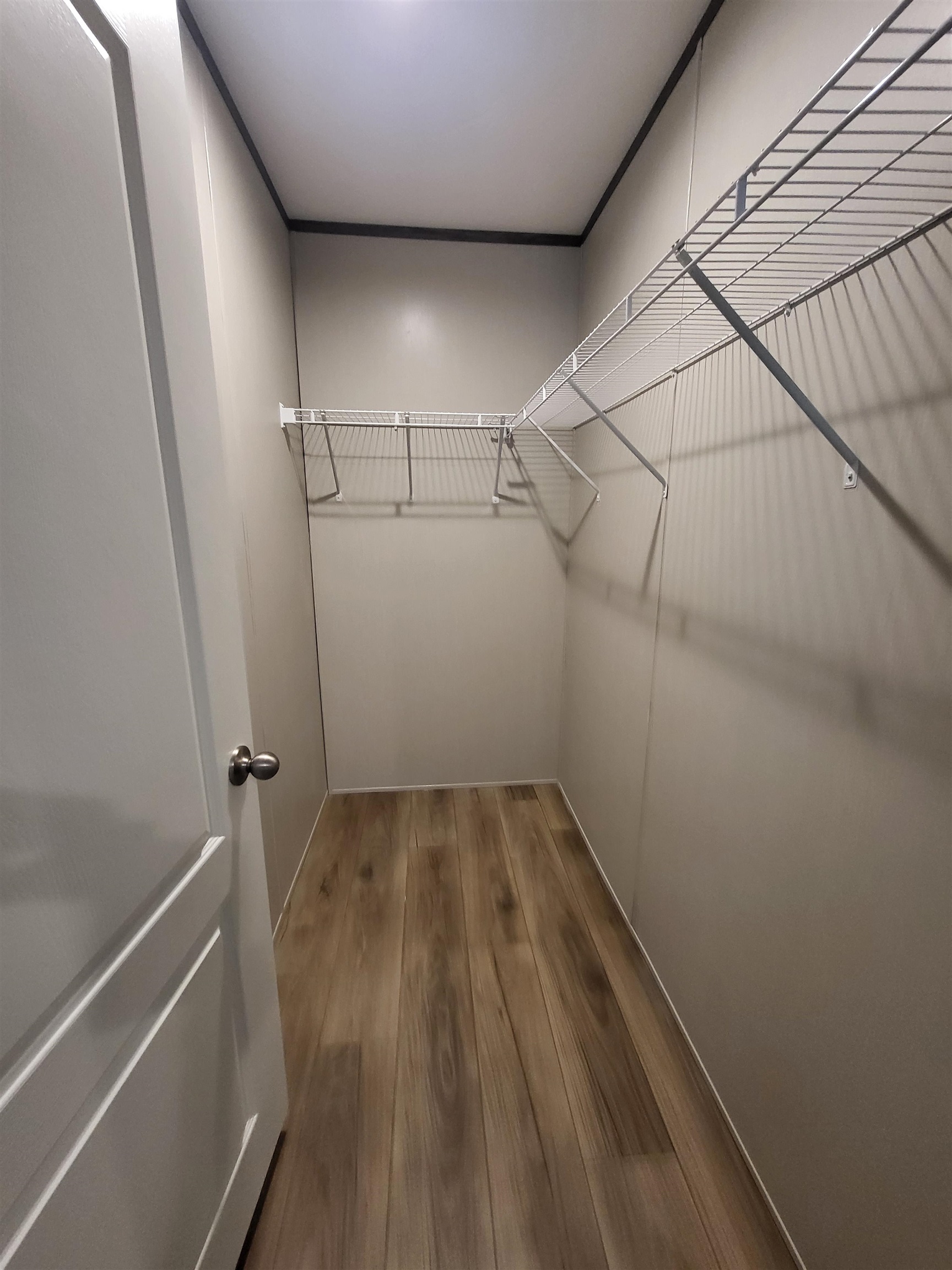 148 Holly Berry Way Fruita, CO 81521 - Photo 12 of 19 a view of a room with racks on the wall