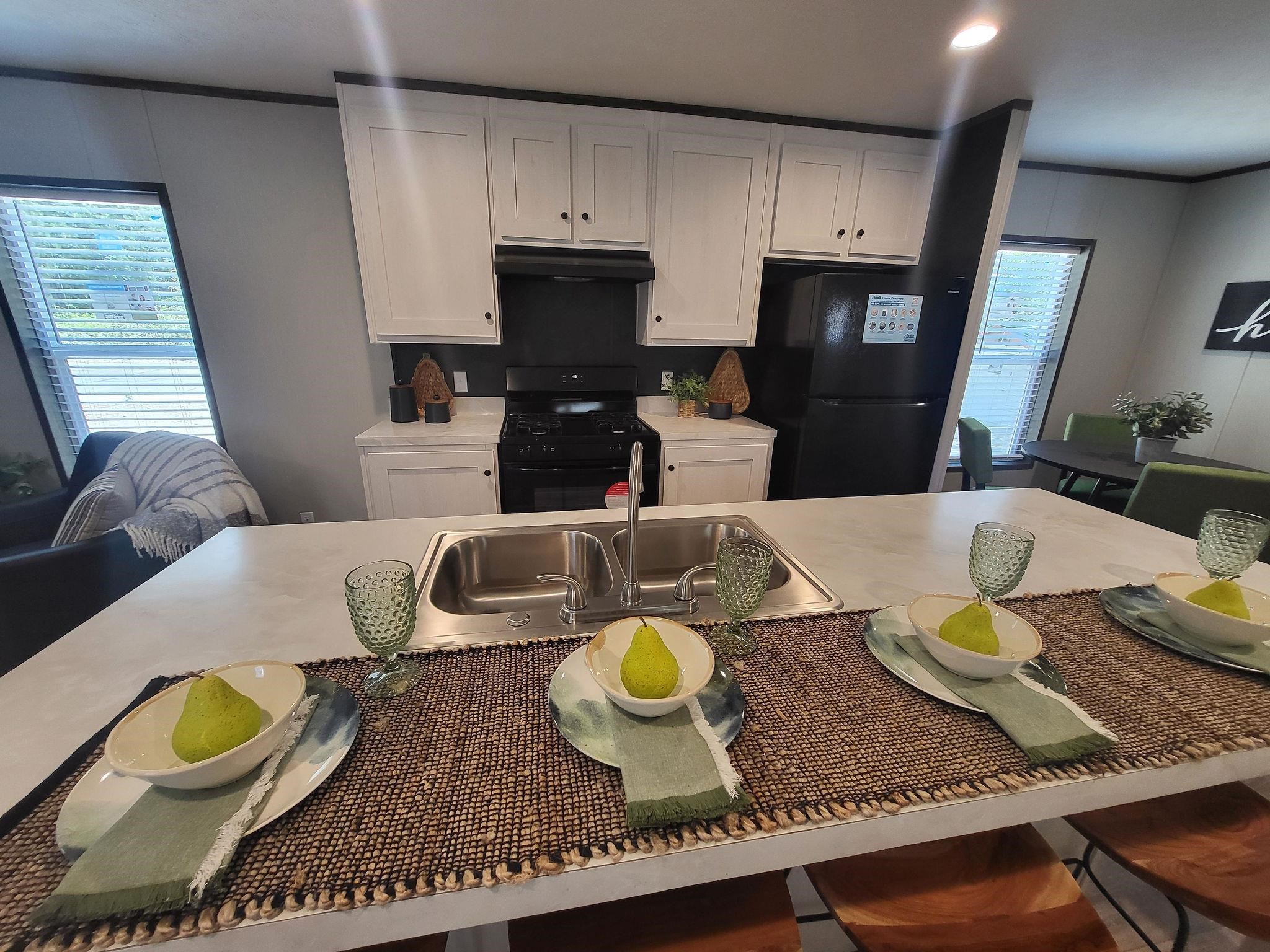 148 Holly Berry Way Fruita, CO 81521 - Photo 5 of 19 a living room with furniture and a table