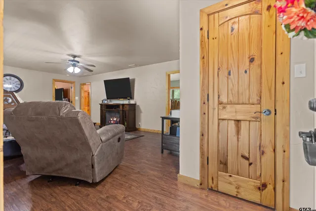 a kitchen with stainless steel appliances granite countertop a refrigerator a sink and a stove