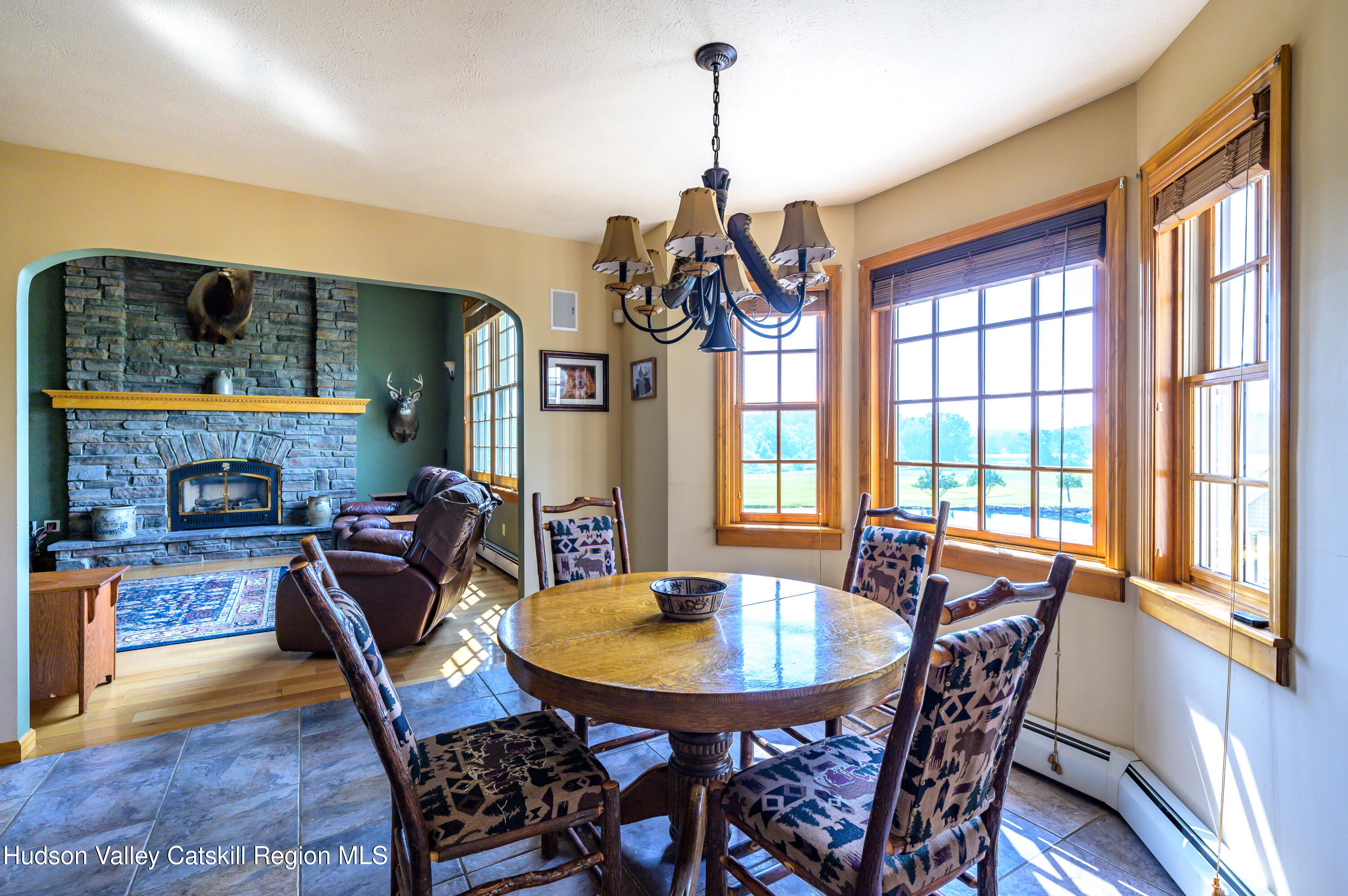 520 Ridge Road Stuyvesant, NY 12156 - Photo 21 of 68 a view of a dining room with furniture window and outside view