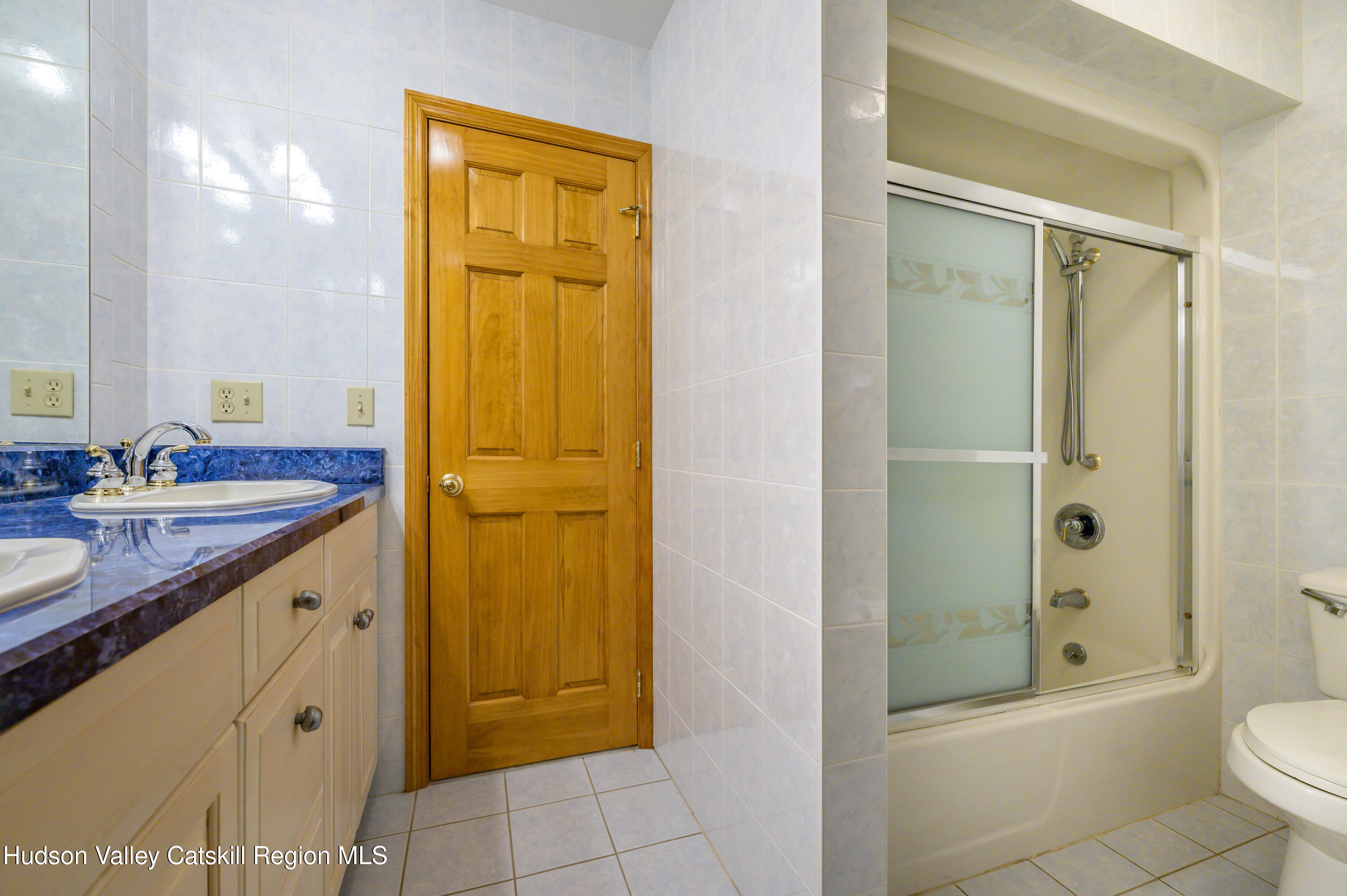 520 Ridge Road Stuyvesant, NY 12156 - Photo 24 of 68 a bathroom with a granite countertop sink toilet and shower