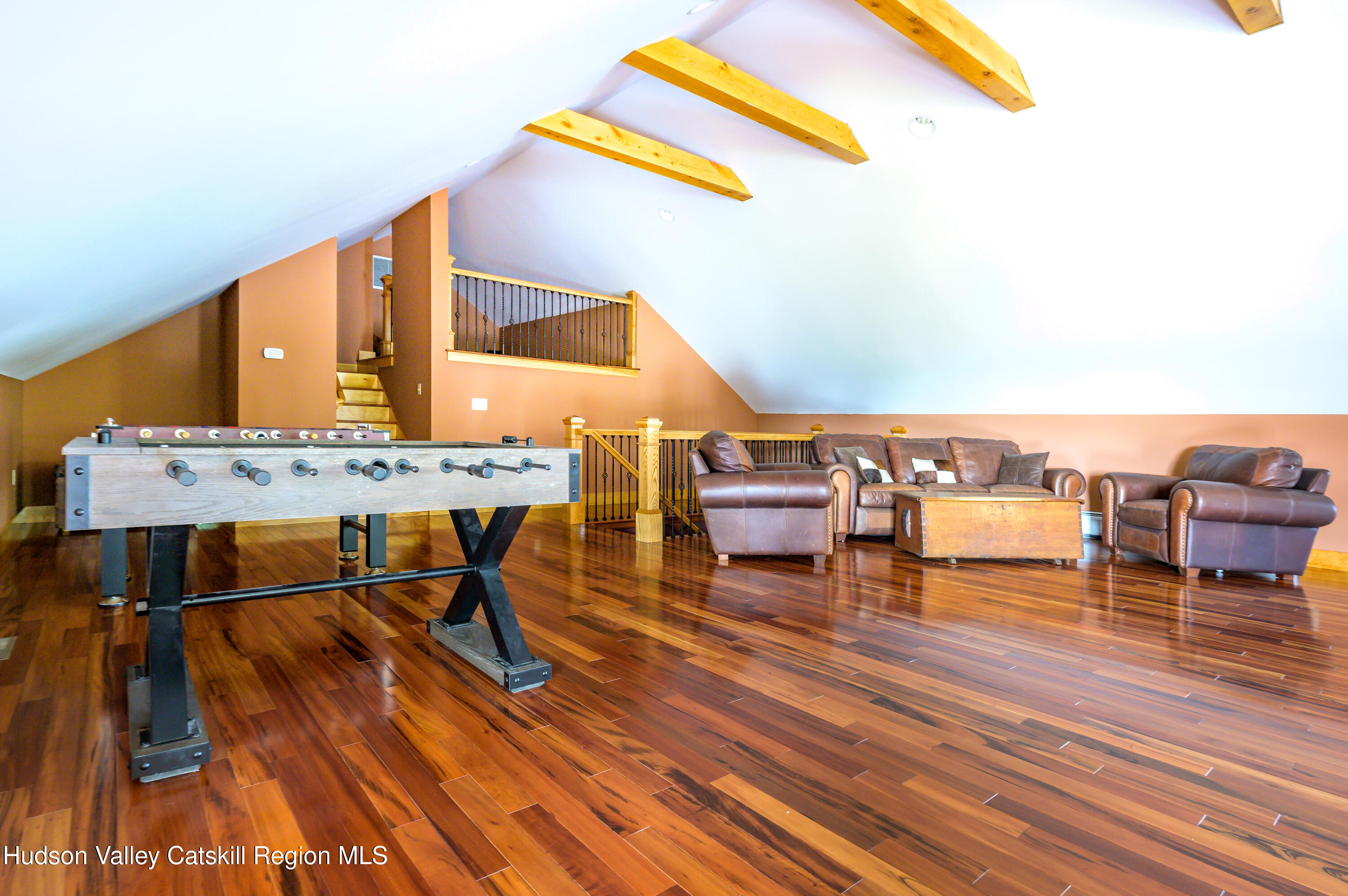 520 Ridge Road Stuyvesant, NY 12156 - Photo 32 of 68 a living room with chairs and a table with wooden floor